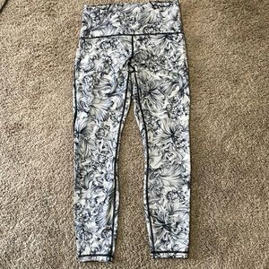 Lululemon size 8 workout tights, black and white floral print